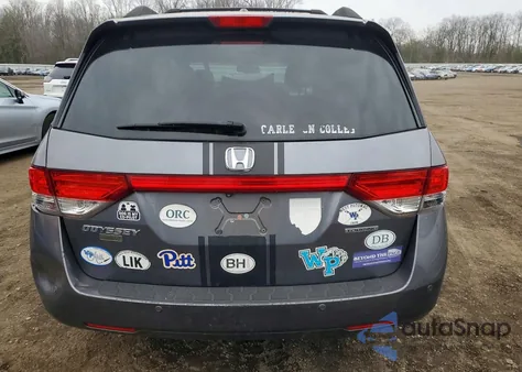 2014 Honda Odyssey Touring z USA, uszkodzony, nr VIN 5FNRL5H91EB032866